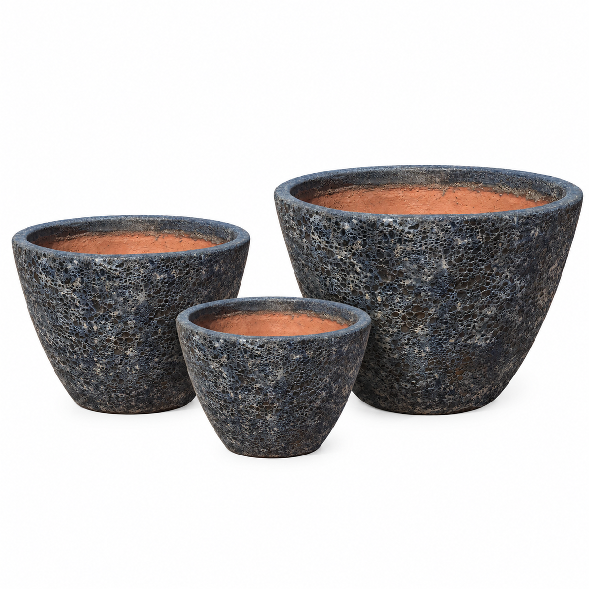 The Relic Rust/Metal Blue Giant Cone Ceramic Planter in three sizes together, each showing the same volcanic-textured charcoal-blue finish and tapered cone shape.