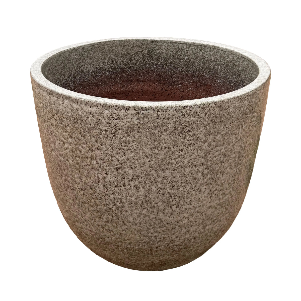 Angled view of a speckle black tapered round ceramic planter, showing its stone-textured speckled exterior, a lighter speckled rim and a darker speckled interior