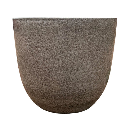 Front view of a speckle black tapered round ceramic planter with a gently rounded body that narrows toward the base, covered in a granite-like grey and taupe speckled glaze