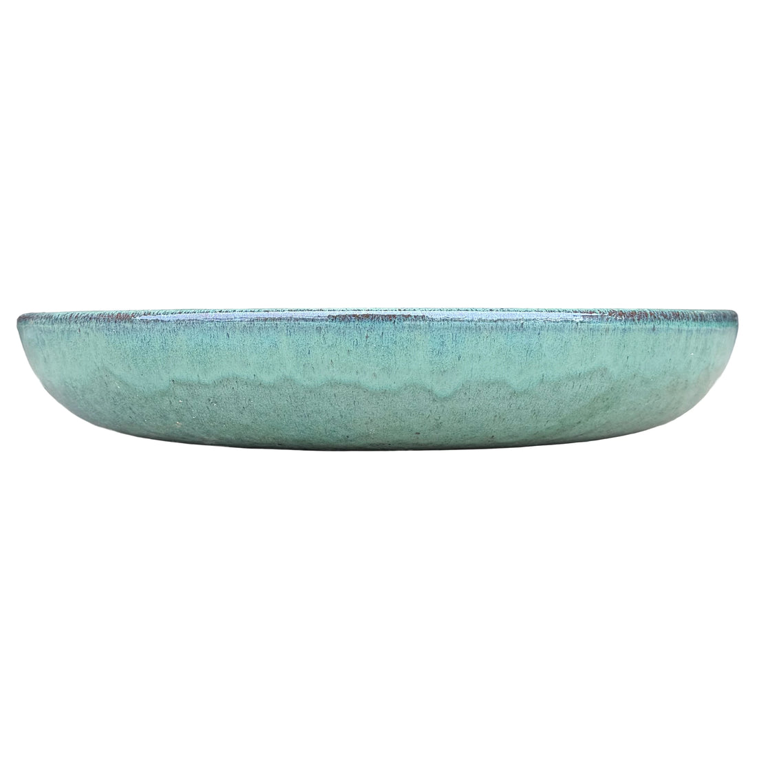 Front view of a low, rounded teal ceramic succulent bowl in sea-green glaze, with a soft wavy drip line around the middle and a speckled rim