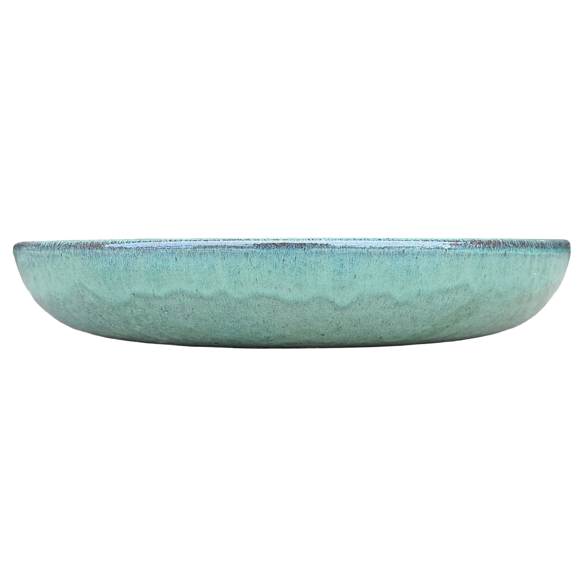Front view of a low, rounded teal ceramic succulent bowl in sea-green glaze, with a soft wavy drip line around the middle and a speckled rim