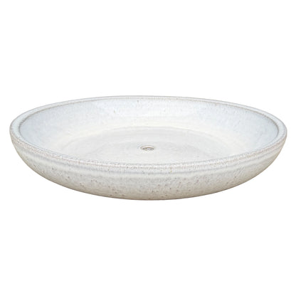 White ceramic succulent bowl viewed at an angle, showing a shallow speckled glaze interior, rounded rim and central drainage hole