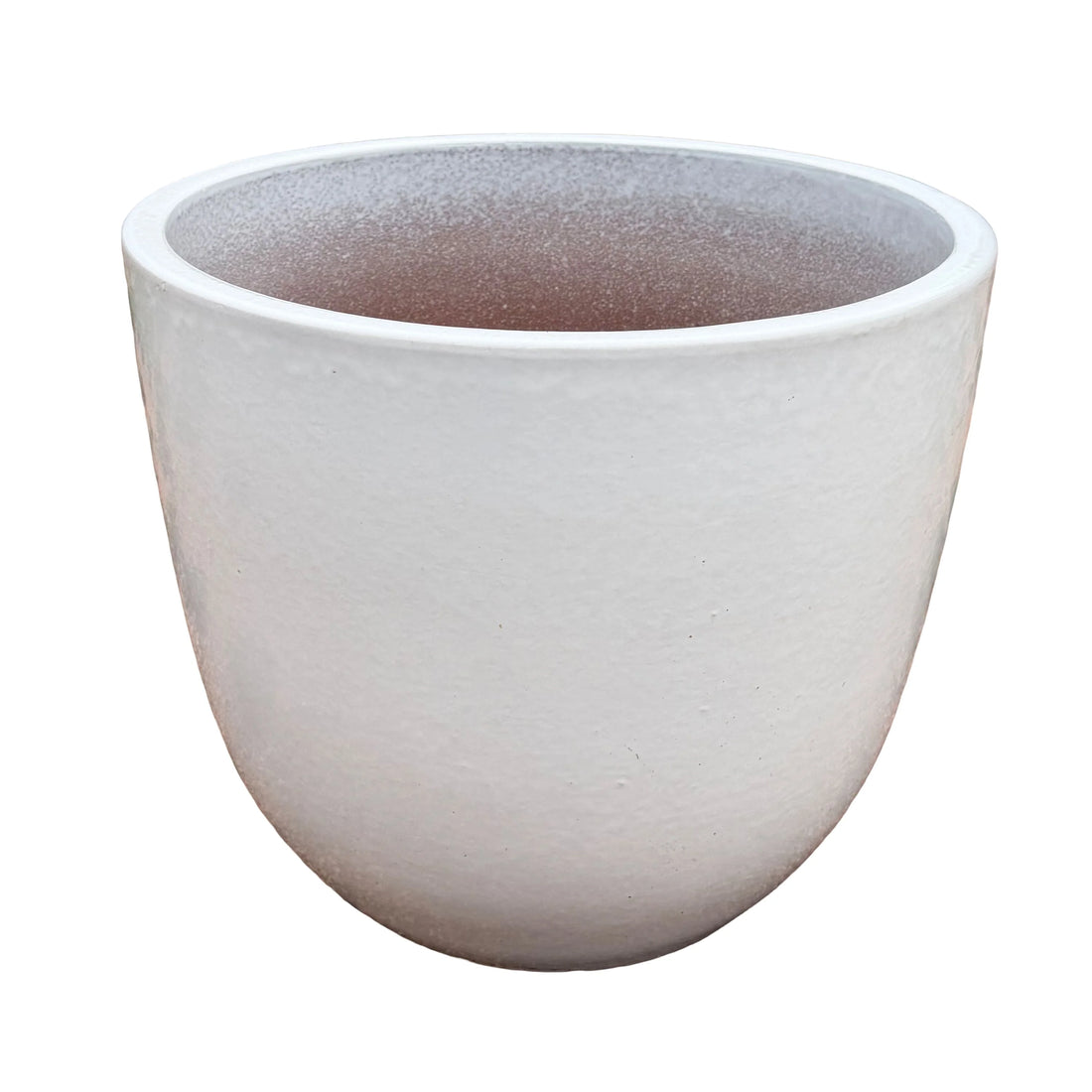 Angled view of a white tapered ceramic egg planter with a smooth rounded body, a soft satin glaze with subtle orange-peel texture, and a speckled interior that warms to terracotta