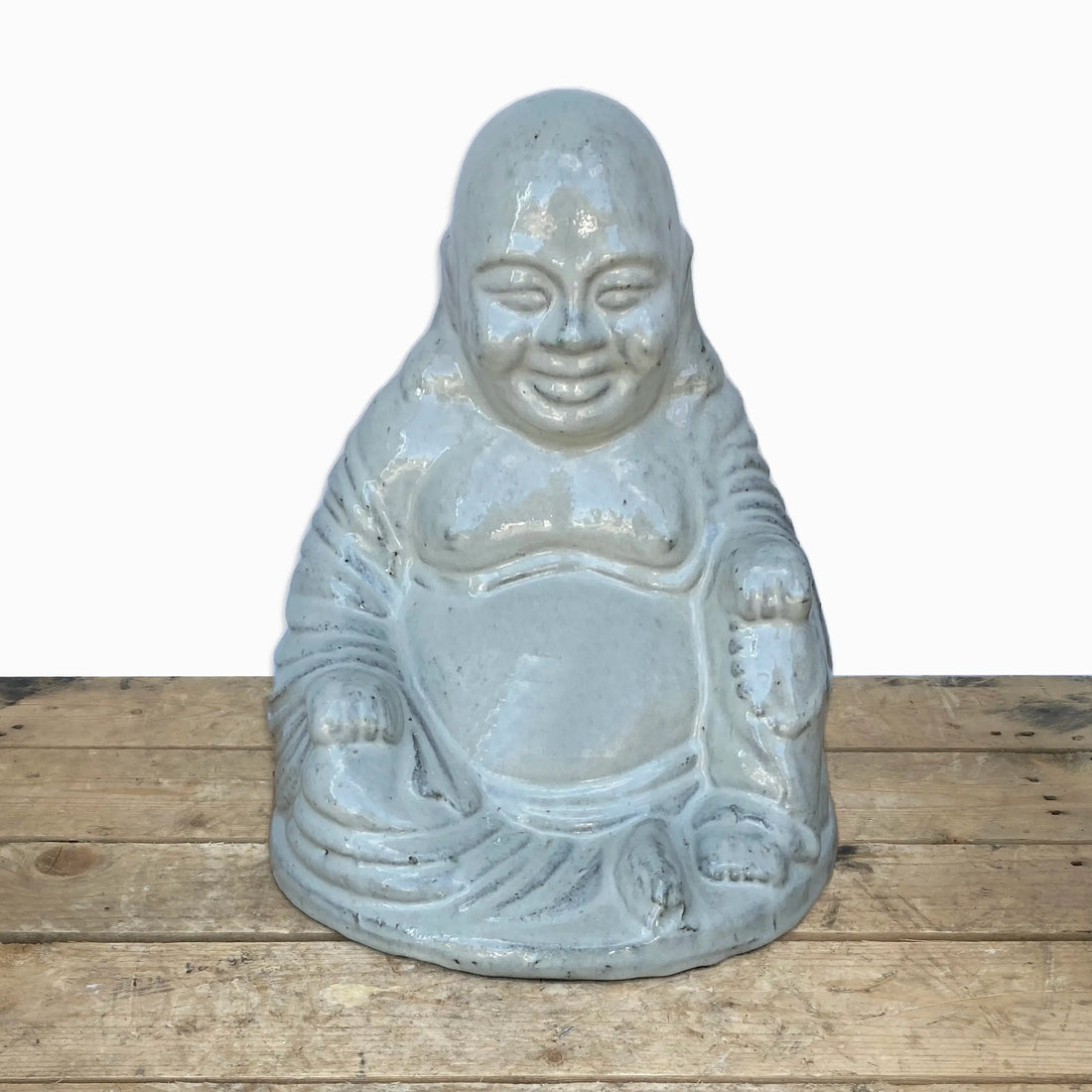Glossy white smiling buddha statue